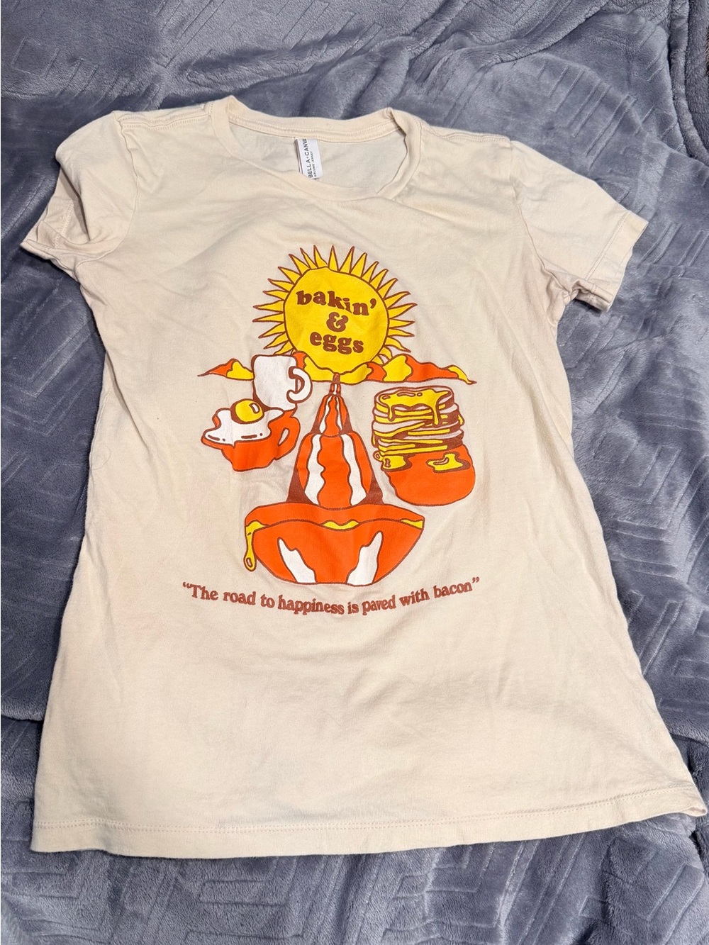 Bella Canvas Cream Tee with Sunburst Graphic in Orange and Yellow